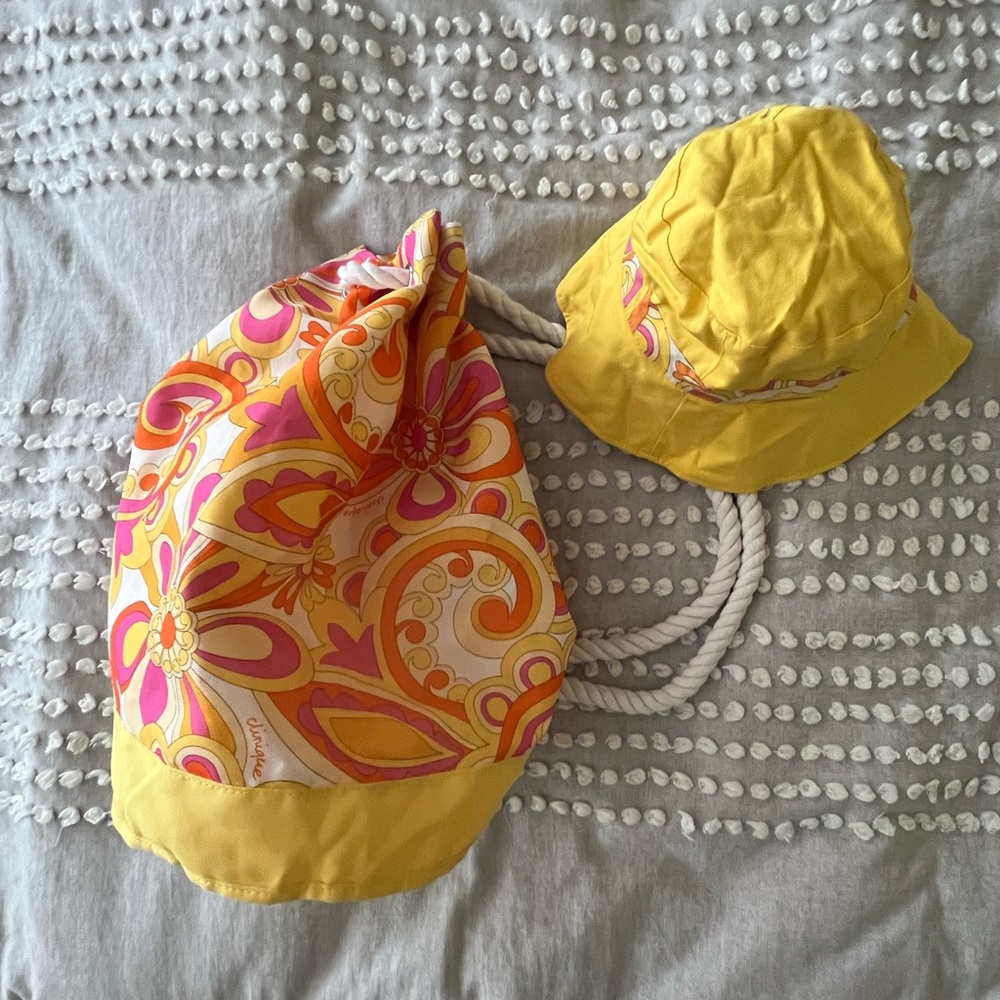 Clinique bag and matching reversible bucket hat retro hippy floral